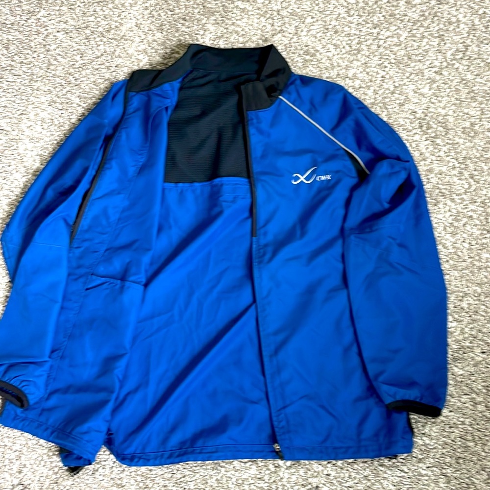 CWX light weight running jacket size Large
